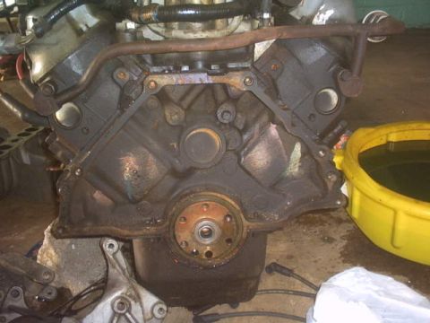 1991 Ford LTD Crown Victoria - Close-up view of an engine block, likely removed for repair or replacement.