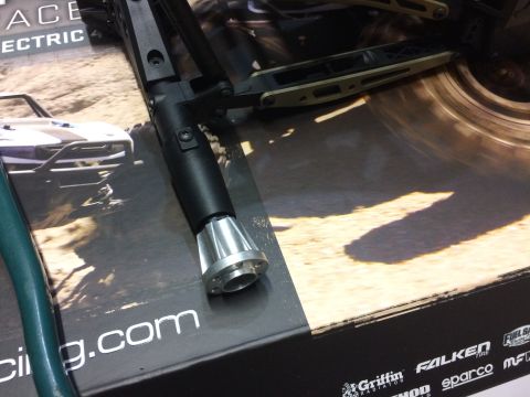 1989 Ford Bronco - Close-up of an RC car part, with branding visible on the box below.