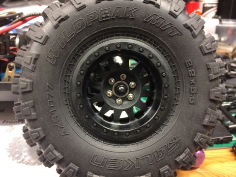 1989 Ford Bronco - This is a close-up view of a tire and wheel assembly, not a full vehicle.