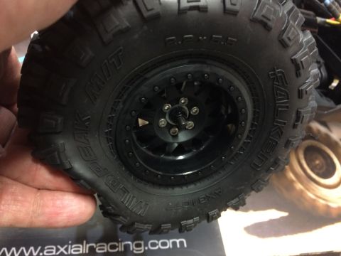 1989 Ford Bronco - This is a close-up of a Falken Wildpeak M/T tire and wheel, possibly from an RC car.