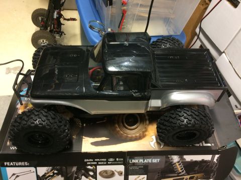 1989 Ford Bronco - This is a remote control truck body, not a real vehicle, sitting on its packaging.