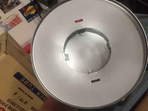 2014 Dodge 1500 - Close-up of an air filter with a metal mesh element. A box labeled 'NER TUBE' is partially visible.
