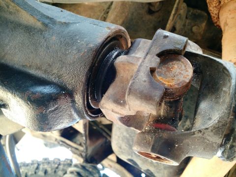 1992 Ford Bronco - This photo shows a close-up view of a vehicle's driveshaft U-joint, a critical component for power transmission.