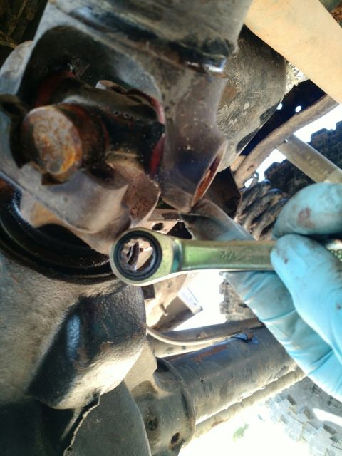 1992 Ford Bronco - 1/2 inch ratchet wrench to remove u joint retainer bolts.