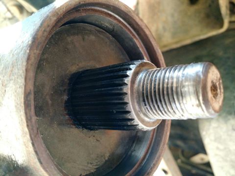 1992 Ford Bronco - nut removed but the threads on the pinion shaft were stripped. this is going to be a problem.