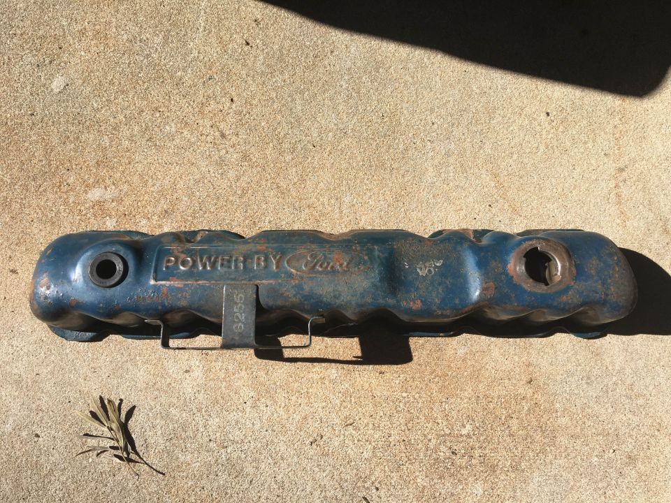 Blue metal valve cover with 'POWER BY Ford' text and part number 9256