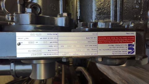 1994 Ford Bronco - Close-up of a Cummins engine data plate showing model and serial numbers, along with other engine specifications.