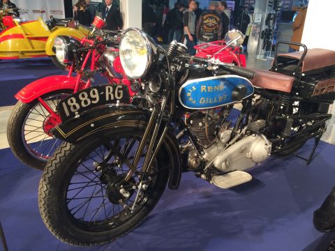 1987 Ford Bronco - A display of classic motorcycles, a Rene Gillet and another vintage bike with a sidecar visible.