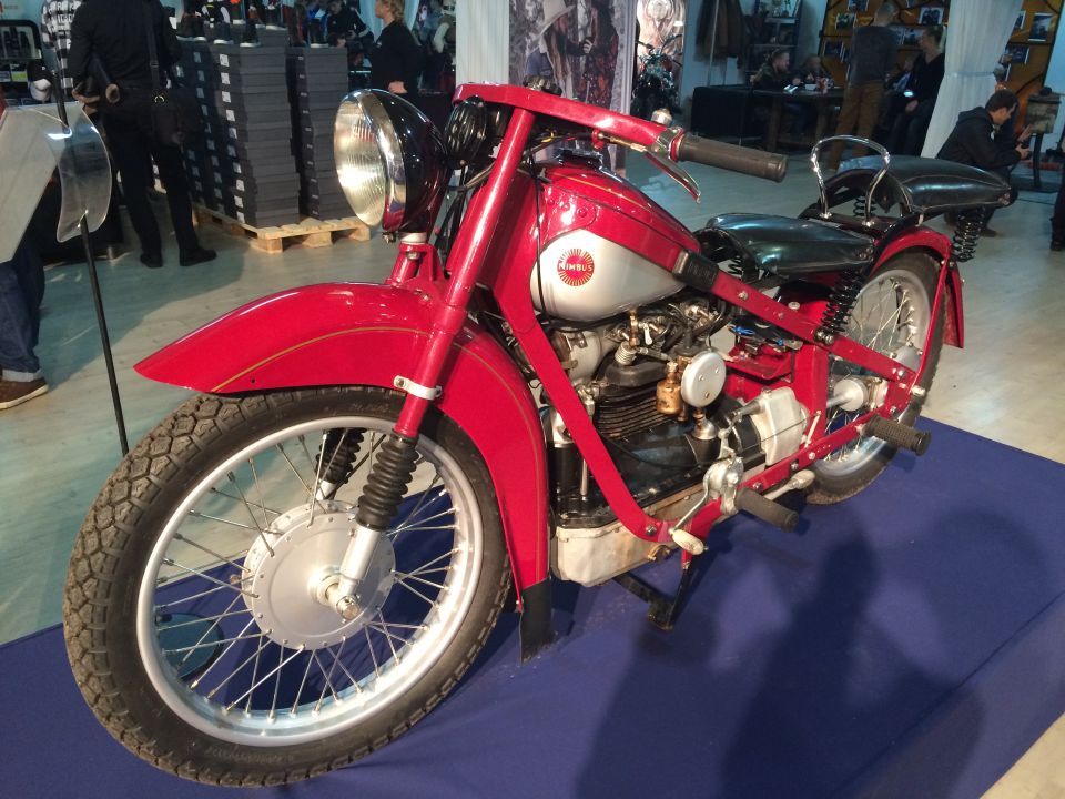 Red motorcycle with silver gas tank and black seat
