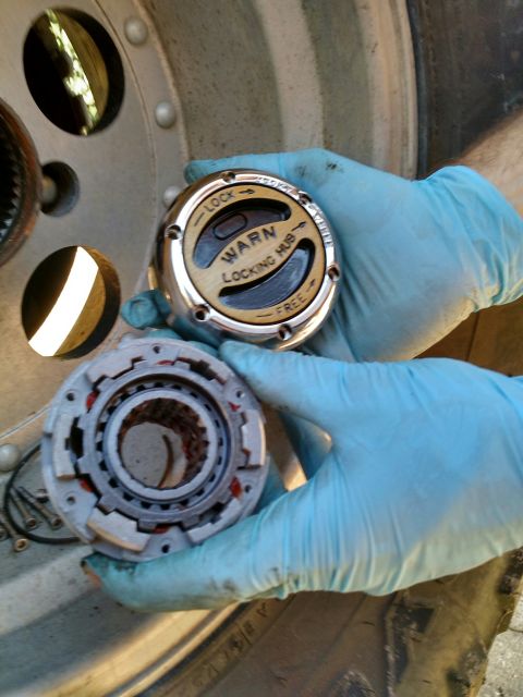 1992 Ford Bronco - with the old lockout removed the new one is ready to go in..the Warns come pre-greased, you don't want to add anything else to them as it c…