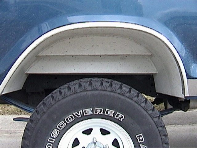Rear passenger side wheel well insert concept
