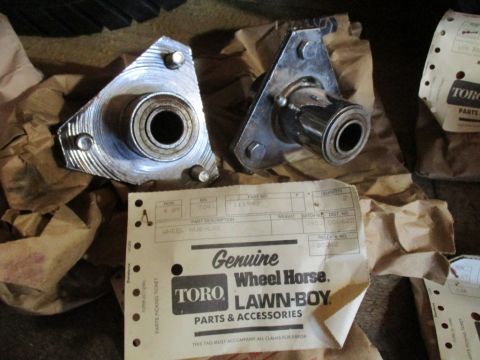 1986 Yamaha BLASTER - Genuine Toro Wheel Horse Lawn-Boy parts are shown, including wheel hubs and packaging.