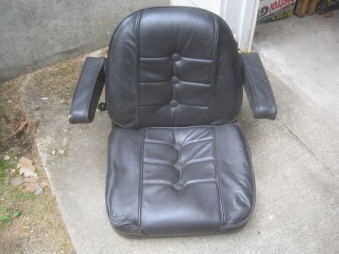 1986 Yamaha BLASTER - This black leather seat with armrests appears to be a replacement part, not a complete vehicle.