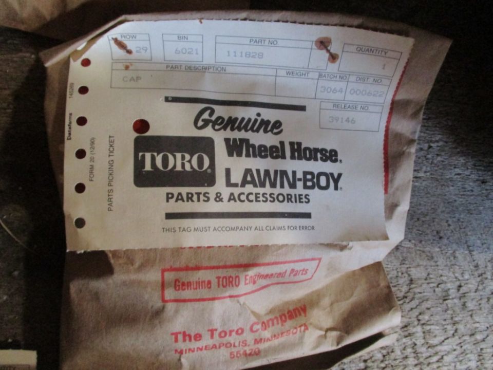 Toro Lawn-Boy parts and accessories tag with part number 111828 and batch number 3064