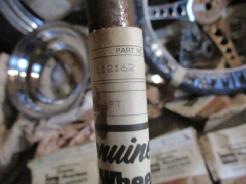 1986 Yamaha BLASTER - Close-up of a part labeled '112162 SHAFT' with 'Genuine Wheel' visible, suggesting it's a component.