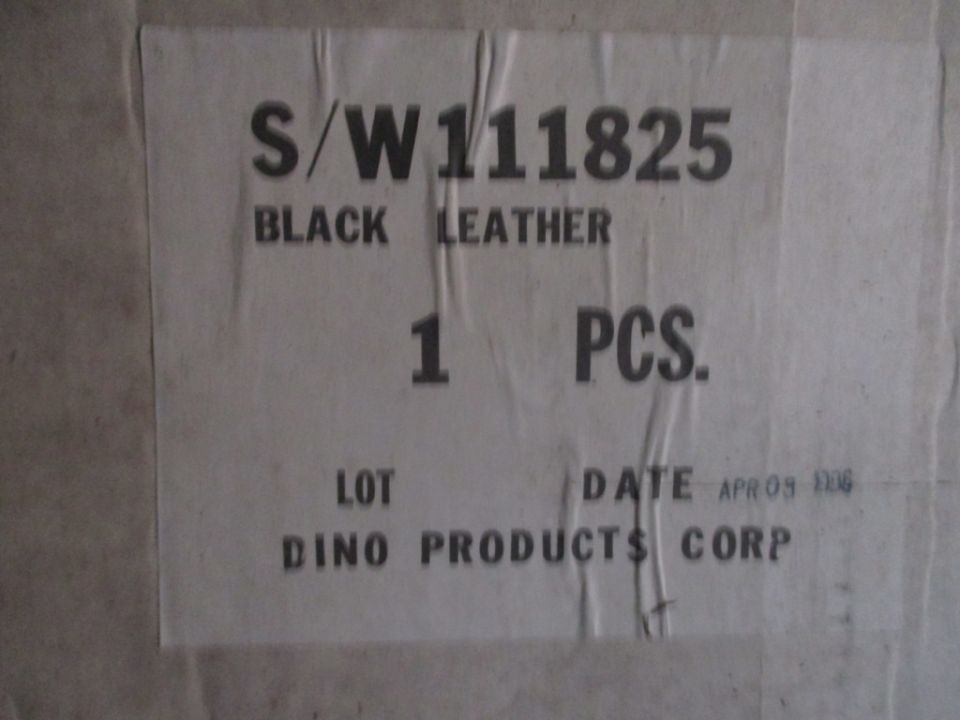 Label with S/W111825, BLACK LEATHER, 1 PCS, LOT DINO PRODUCTS CORP, DATE APR 09 1986