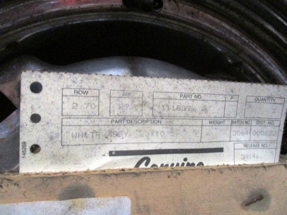 Part label with text including 'PART NO 111839' and 'PART DESCRIPTION WH&TH 23X10 5'