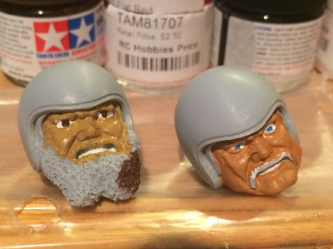1989 Ford Bronco - Model kit heads with helmets are shown with painted faces and beards.