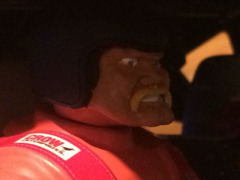 1989 Ford Bronco - Toy figure with a red vest and 'CROW ENTERPRISES' logo visible.