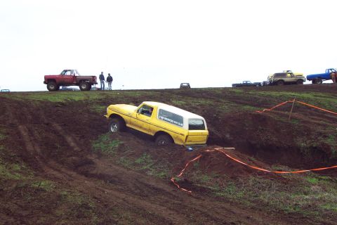 1996 Ford Bronco - Steve attempting a wall climb obstacle. I tried it too. Neither of us made it, but Jim did. (3/6/2004)