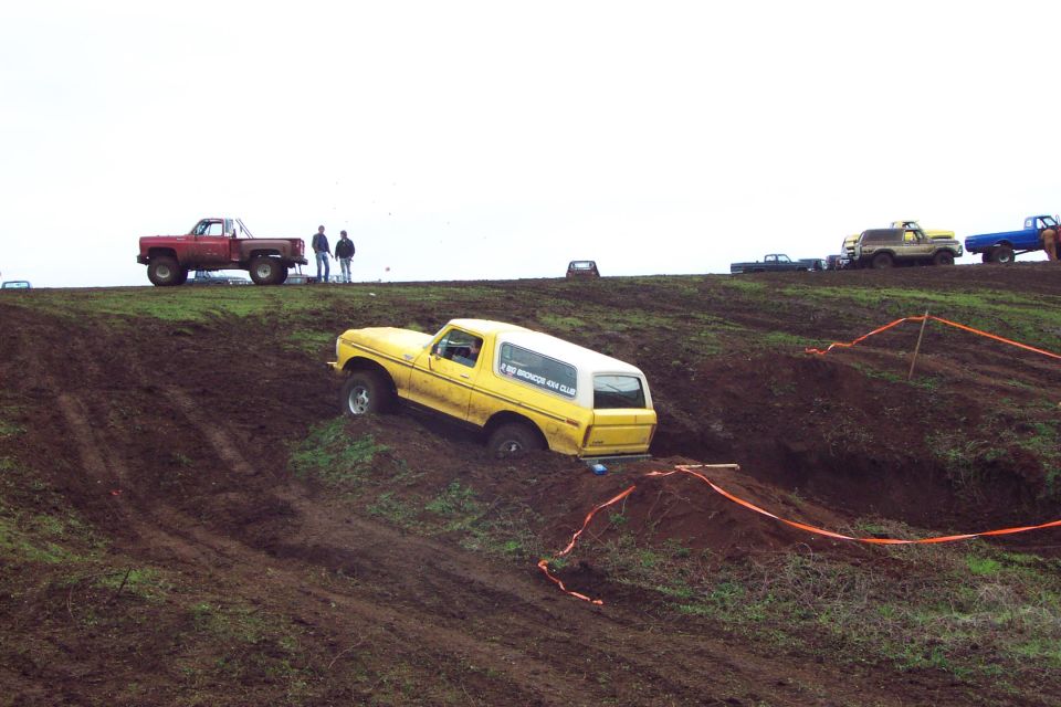 Steve attempting a wall climb obstacle.  I tried it too.  Neither of us made it, but Jim did.
(3/6/2004)