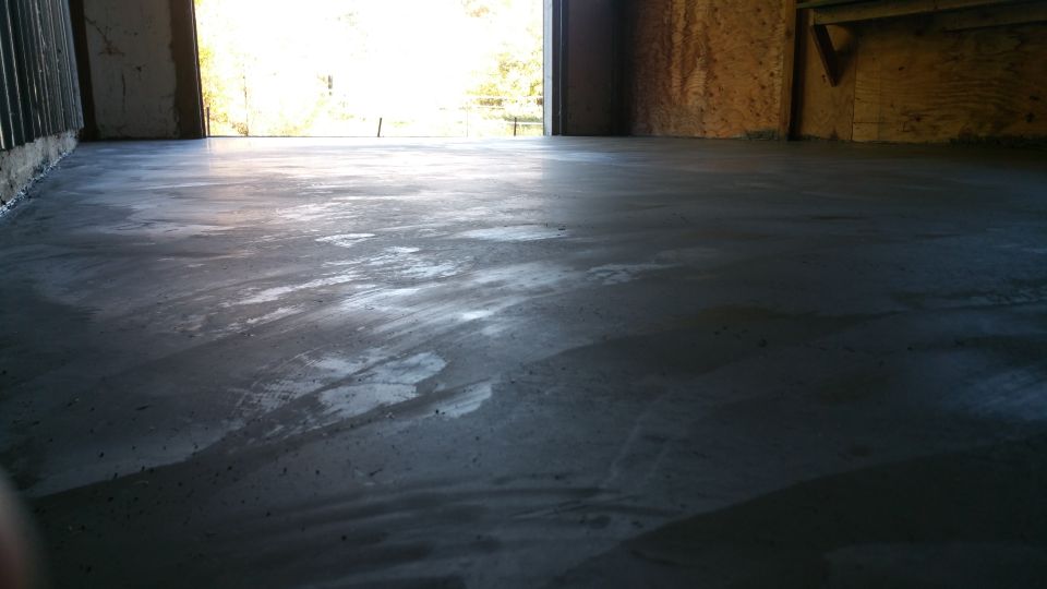 Wet concrete floor inside a building