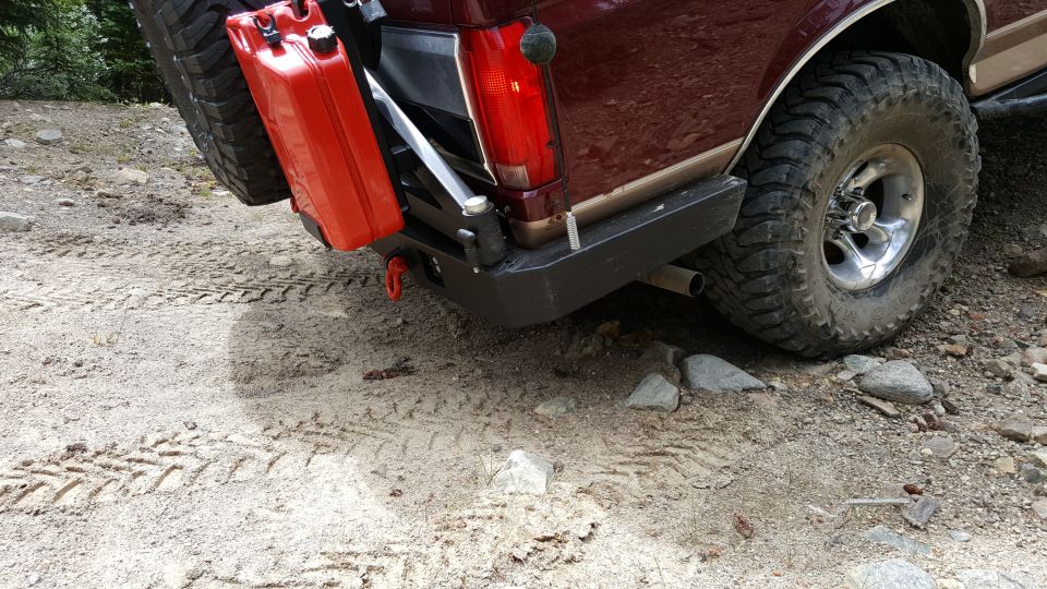 1996 Ford Bronco rear with spare tire, red jerry can, and aftermarket bumper