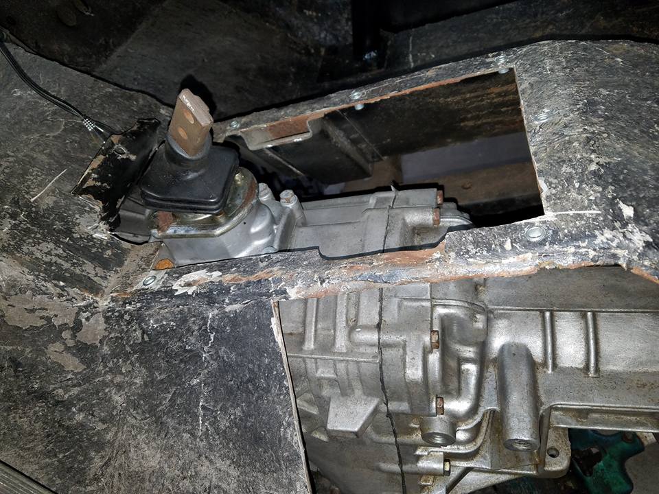 Underbody view of transmission and transfer case with shifter