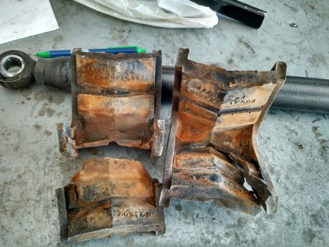 1992 Ford Bronco - Old rubber c-bushings (7 degree). These were completely split in half.