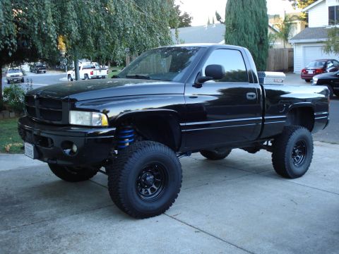 1989 Ford Bronco - 01 Dodge Ram, 6" Fabtech lift, 35" BFG,s