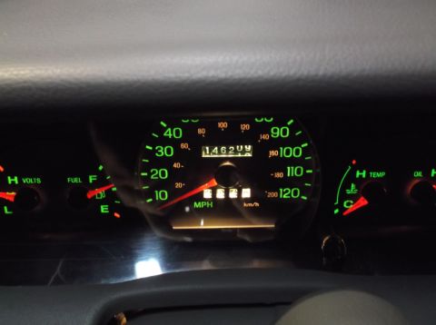 1999 Mercury Grand Marquis - The odometer shows 146,209 miles on the dashboard gauges.