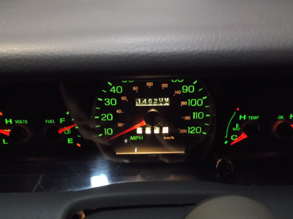 Dashboard gauges with odometer reading 146209, fuel and temperature indicators