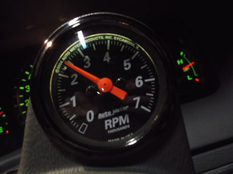 1999 Mercury Grand Marquis - The tachometer shows RPMs, and the fuel gauge indicates the fuel level.