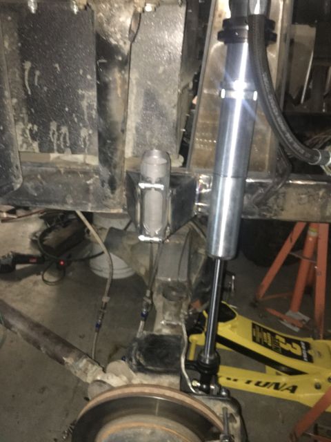 1961 International Scout 800 - Custom rear suspension components are visible, including a shock absorber and brake assembly.