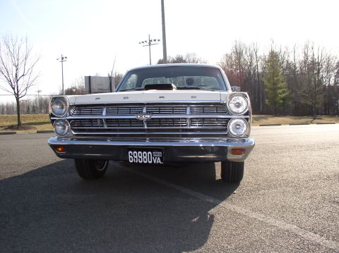 1967 Ford Ranchero - The front grille and headlights of a classic Ford Fairlane are visible in this frontal shot.