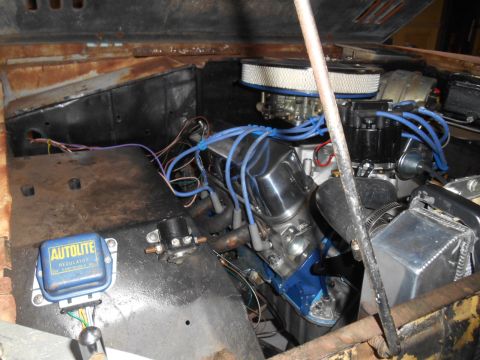 1972 Ford Bronco - The engine bay shows a V8 engine with various aftermarket parts and visible wiring.