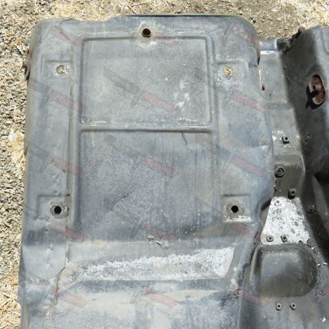 1976 Chevrolet Corvette - This appears to be a car part, possibly a splash shield or underbody panel, with visible mounting points.