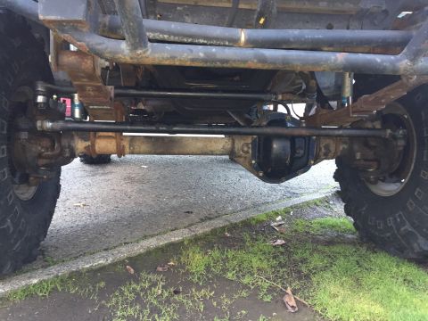 1994 Ford Bronco - Close-up of the undercarriage, showing suspension and drivetrain components.