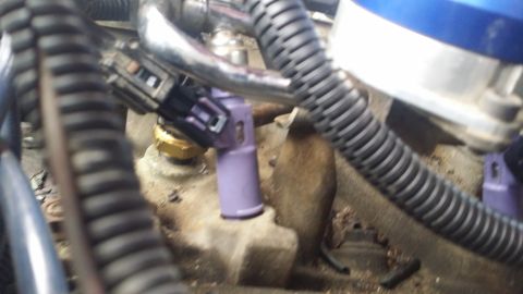 1996 Ford F-250 - Whew. Close. After getting all the injectors in and rails bolted back down I did not think to check for clearances. This is cylinder number…