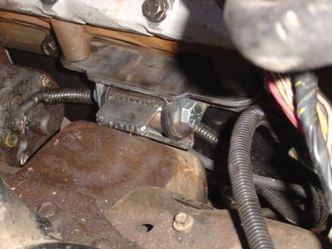 1986 Ford Bronco - Close-up of a custom-fabricated engine mount bracket.