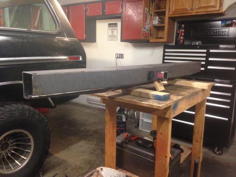 1979 Ford Bronco - A custom metal bumper is shown being fabricated and measured for a 1979 Ford Bronco. The bumper is a long, rectangular steel tube resting o…