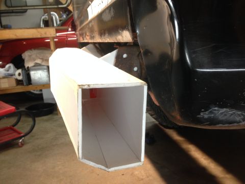 1979 Ford Bronco - A custom-made, white, rectangular exhaust tip is mounted to the rear of a black Ford Bronco. The exhaust tip is positioned to the left of t…