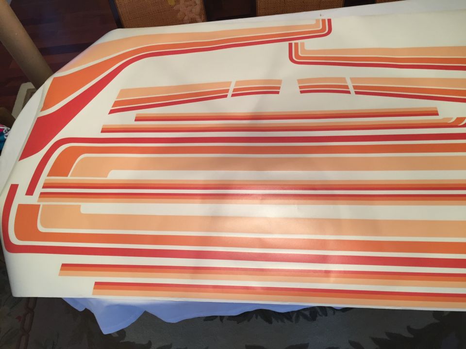 Sheet of red, orange, and yellow stripe decals for a vehicle