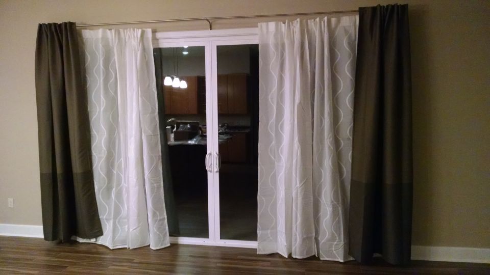 The new Ikea store opened, and we found some curtains & rods we liked there. The sheer is on a tight cable.