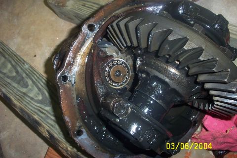 1979 Ford F-150 - Close-up view of a vehicle's differential assembly, showing gears and a bearing.