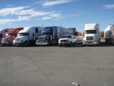 2001 Ford Excursion - Parked with the big boys while towing my 30 foot Formula cigarette boat from Seattle to Paris, TX,