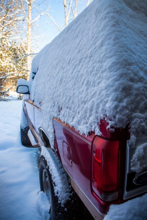 1995 Ford Bronco - This 1995 Ford Bronco is parked outside during a snowstorm.