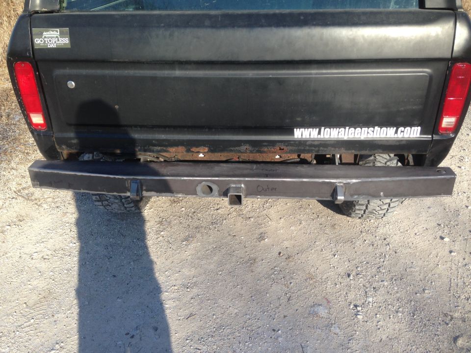 1979 Ford Bronco rear with custom bumper and hitch receiver. Sticker says 'GO TOPLESS DAY'
