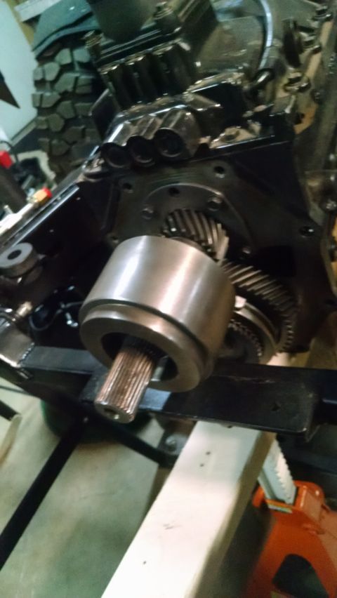 1985 Jeep CJ7 - Close-up of an engine component a splined shaft and visible gears, likely part of a transmission or transfer case.