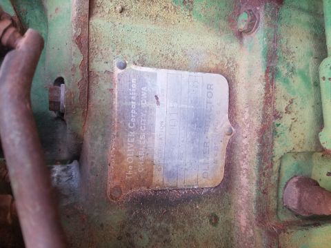 1955 Ford Bronco - Data plate from an Oliver tractor, indicating a serial number of 1015.